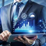 Businessman using tablet with digital analytics to make data-driven decisions in iGaming