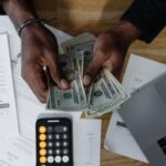 a man counting money and making plans