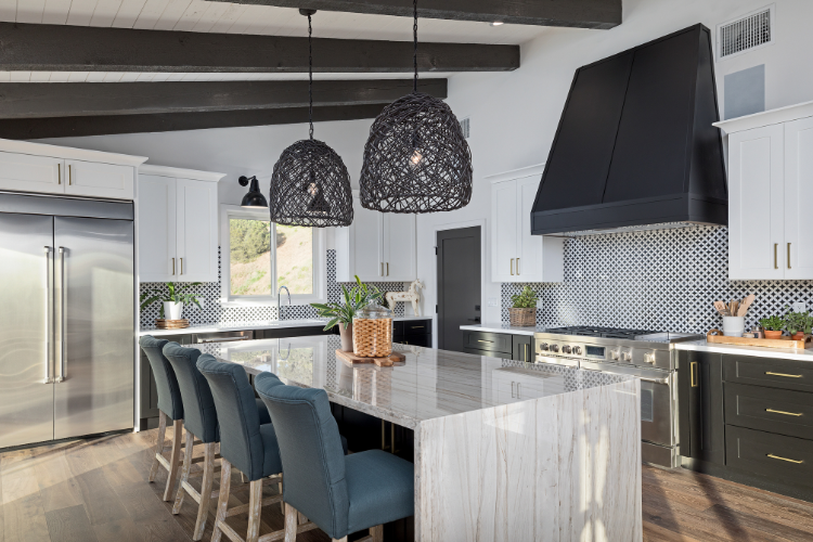How High-Impact Kitchen Features Can Deliver Better Returns On Home Renovations Modern kitchen with black range hood